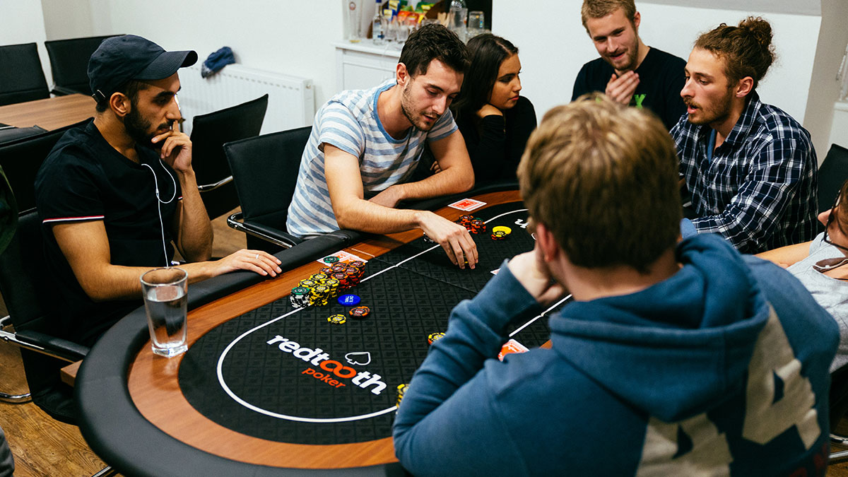 People playing poker in a bookable room