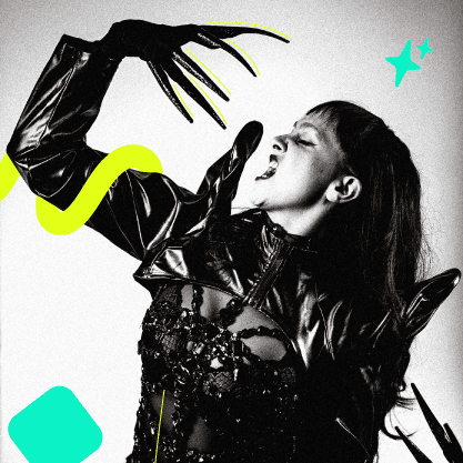 Carrie as Lady GAGA, in black and white with green accents
