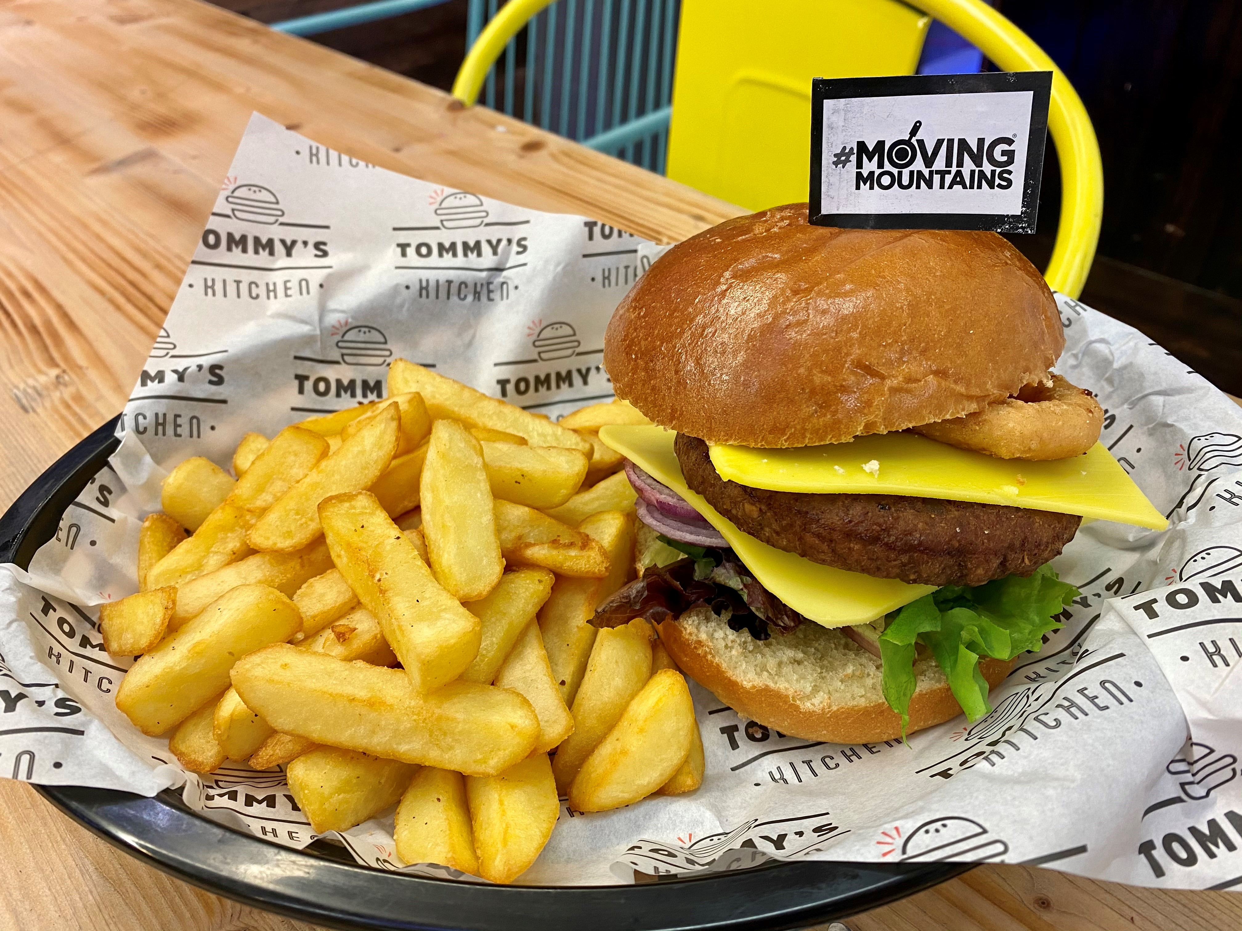Image of a Moving Mountains burger with reular fries